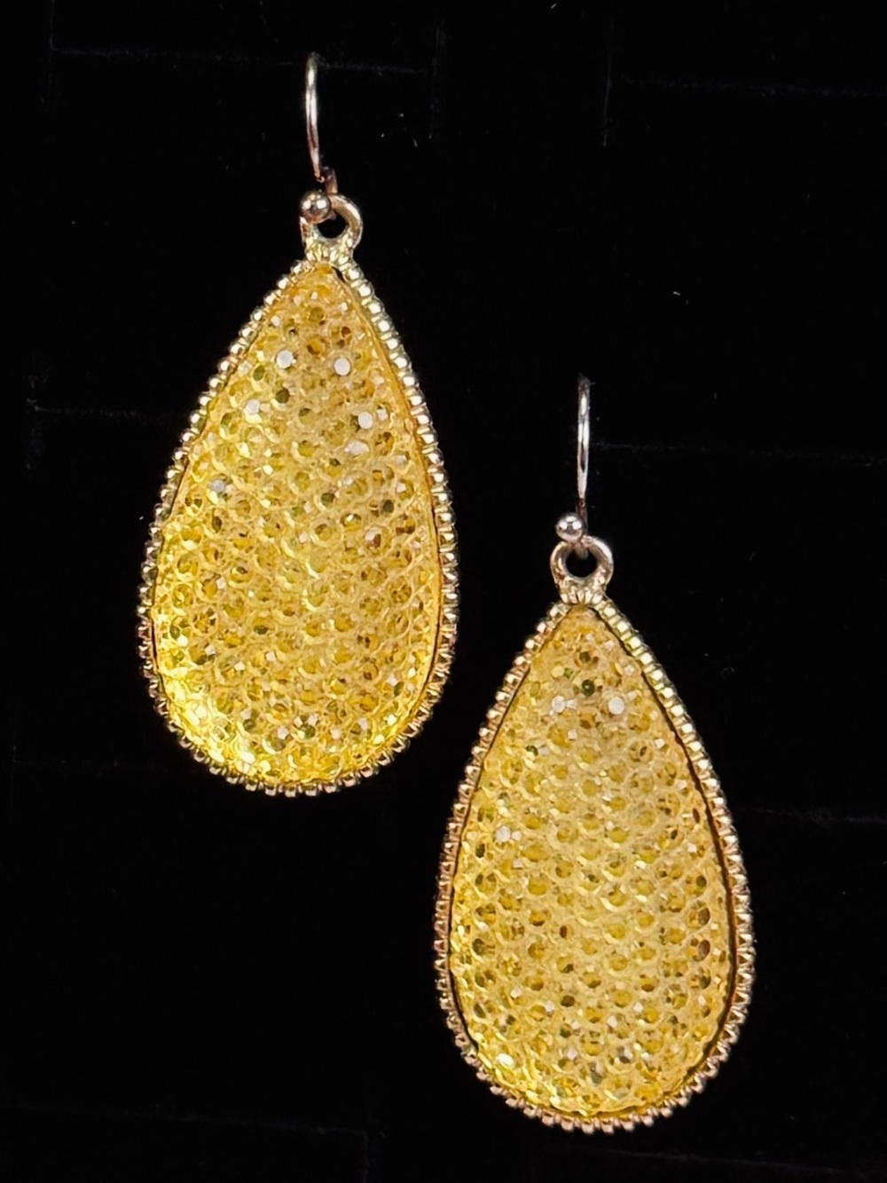 Aged goldtone and yellow-ish teardrop pierced earrings